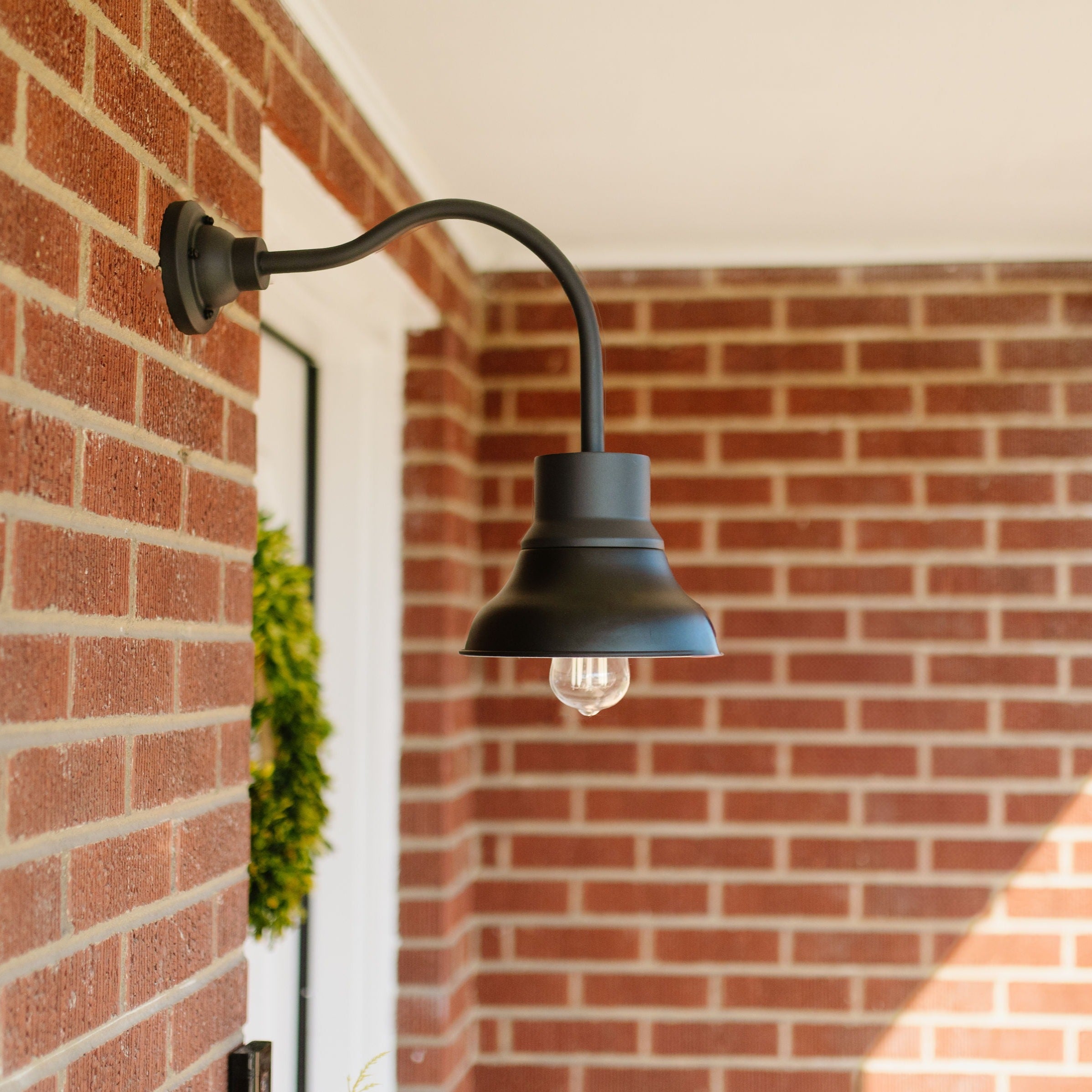 Black outdoor lighting by Post & Porch, home of curb appeal accessories for the front porch and beyond