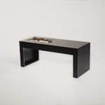 A sleek, modern black planter bench with a rectangular shape, designed to be placed on a front porch or garden area.