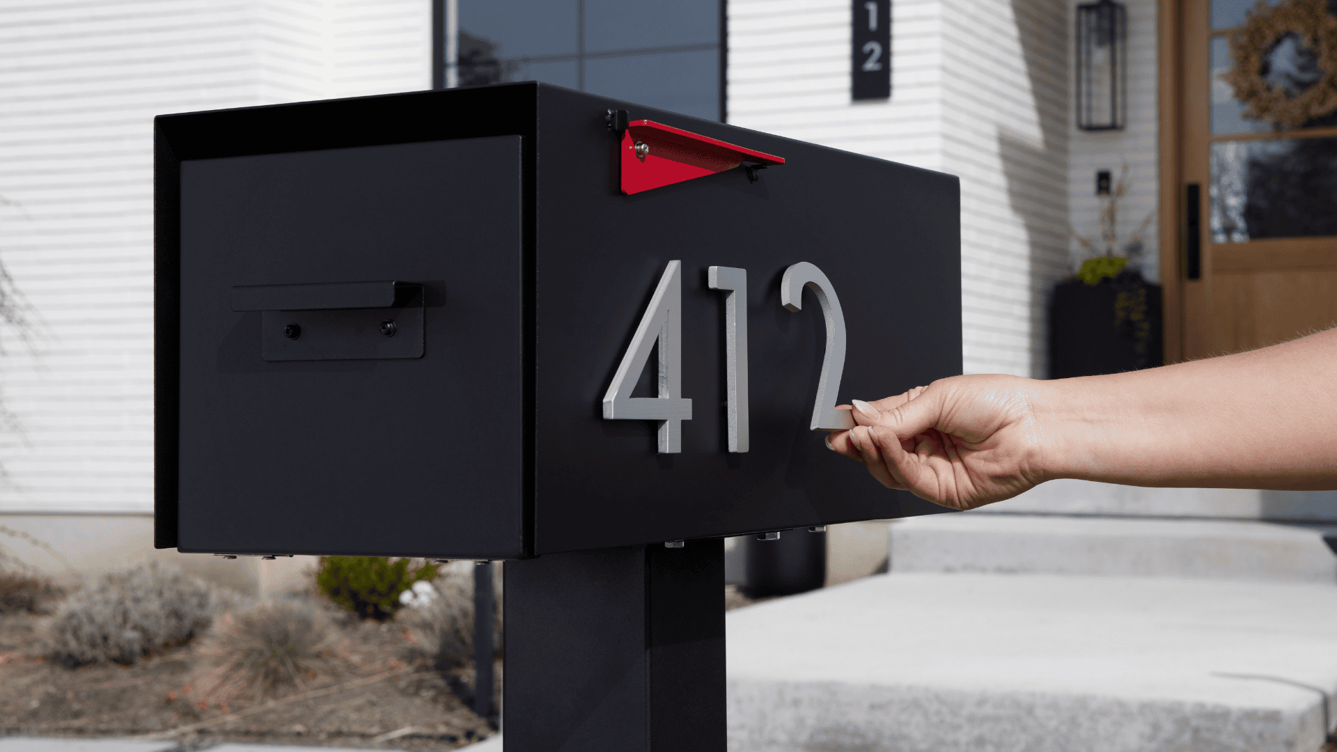 50 Reasons You Need a Modern Mailbox by Post & Porch, featuring The Malone post-mount mailbox with lock