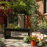 A sleek, modern Solitude Planter Bench in black color by Post & Porch