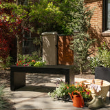 A sleek, modern Solitude Planter Bench in black color by Post & Porch