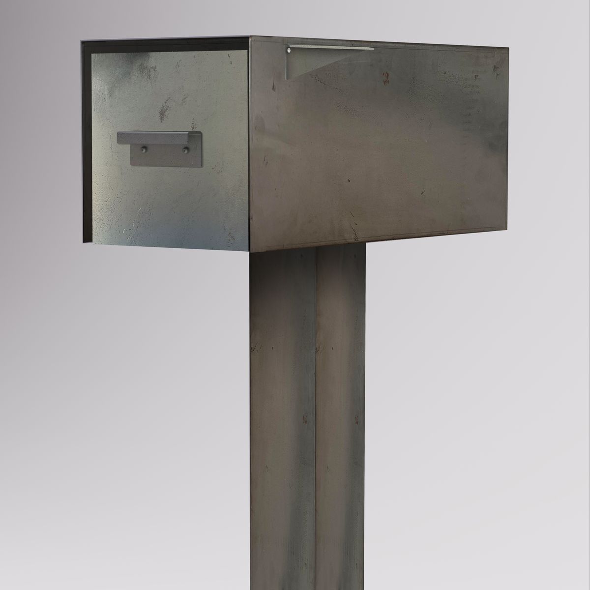 The Malone mailbox rendered in raw Corten steel before patina